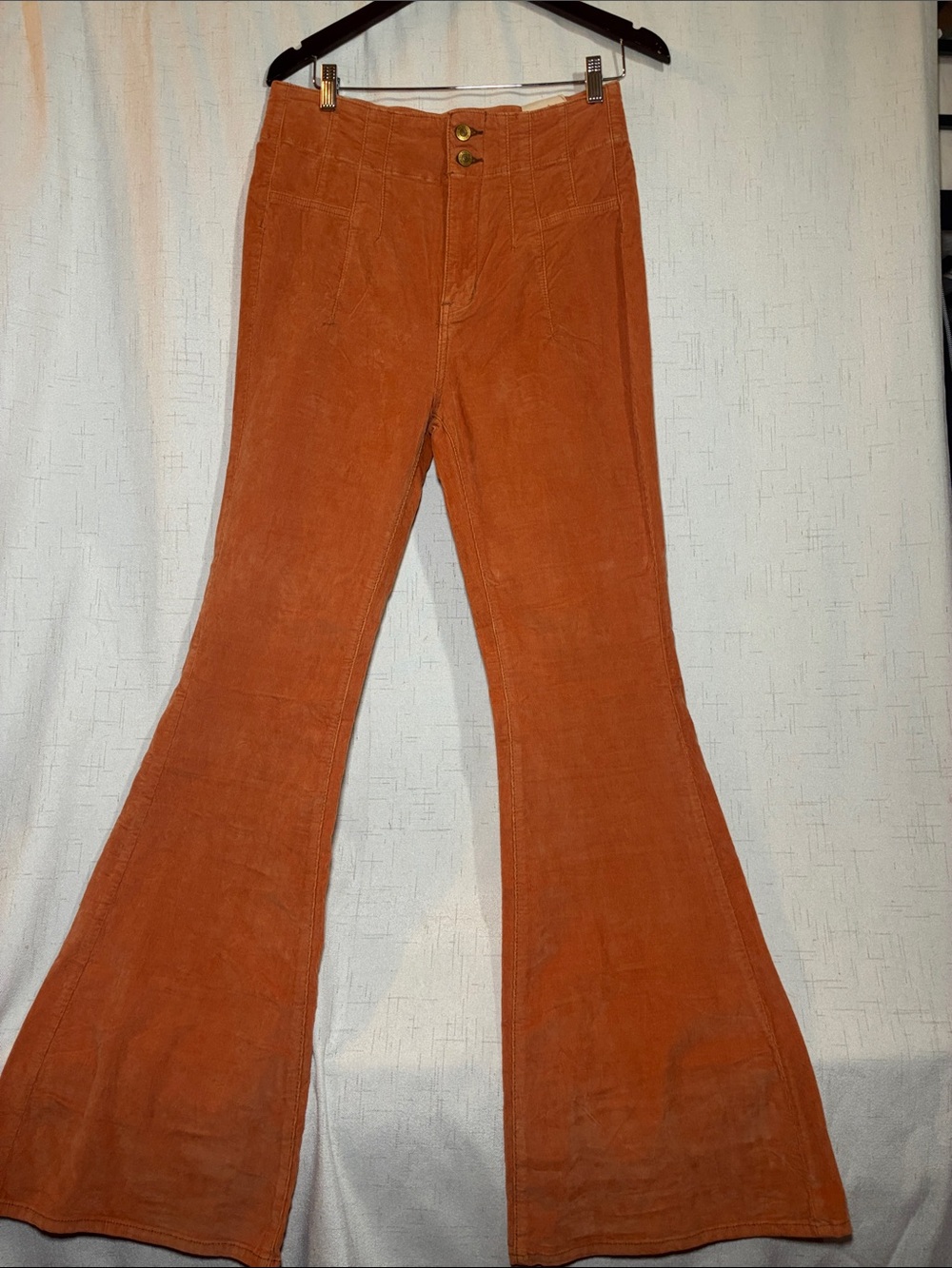 We The Free Flared Corduroy Jeans in Rust Orange